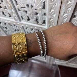 Coach Gold Tone Signature C Logo Hinged Bangle Bracelet Fashion Jewelry